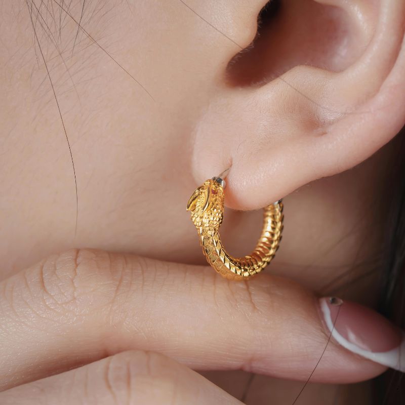 Why does gold jewelry sometimes leave a dark stain on your skin?